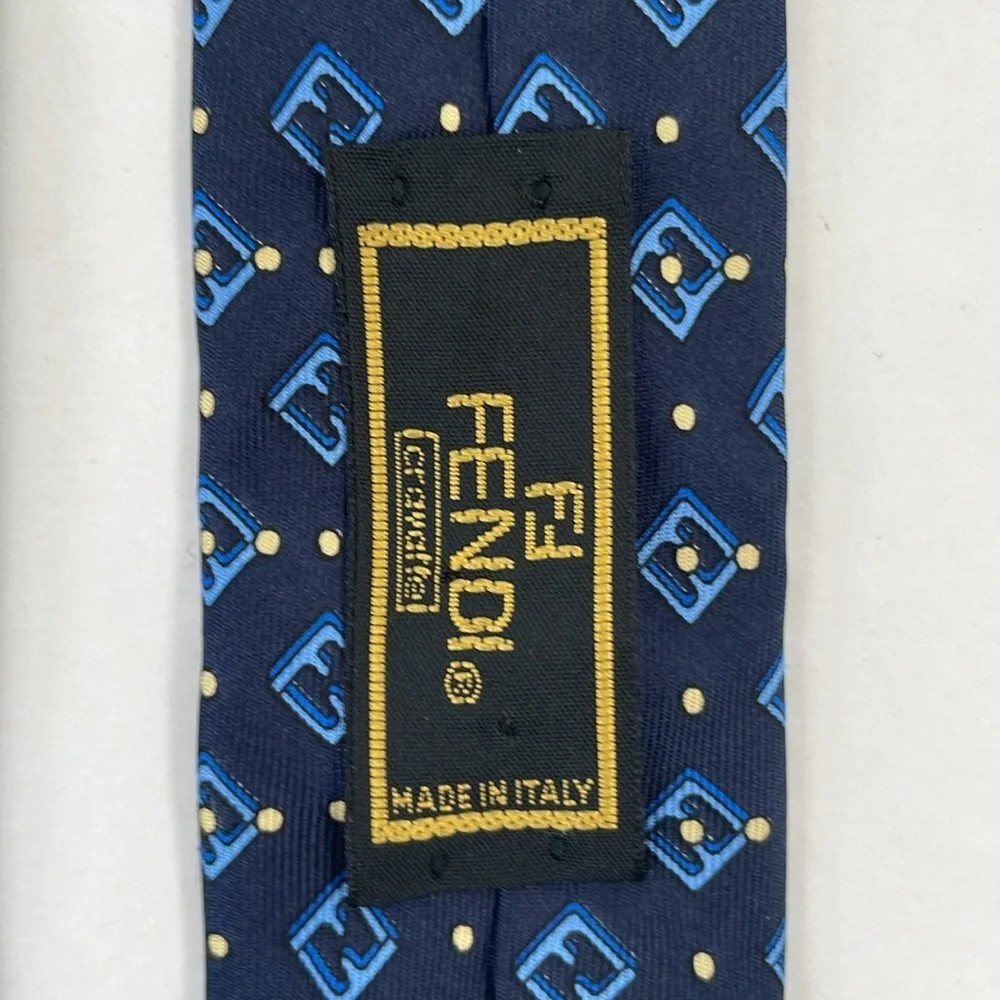 Fendi Cravatte Silk Tie Navy Blue with Light Blue Fendi Logo Yellow Dots